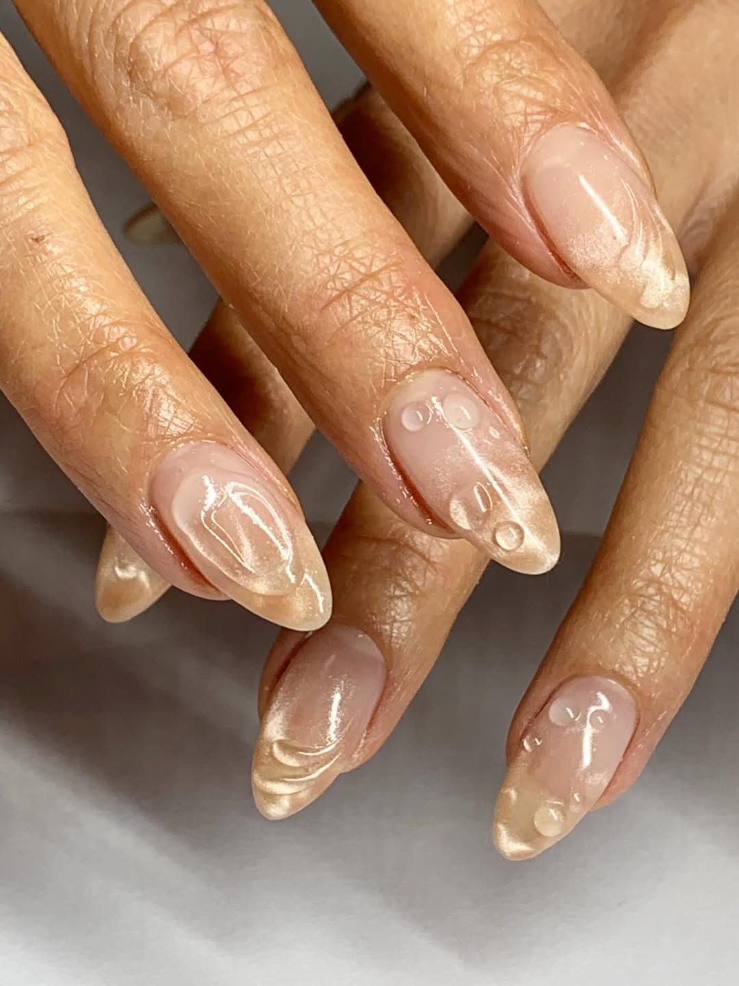 Milky Nude Almond with Glossy 3D Water Drops Milky Nude Almond with Glossy 3D Water Drops — Simple 3D Nails