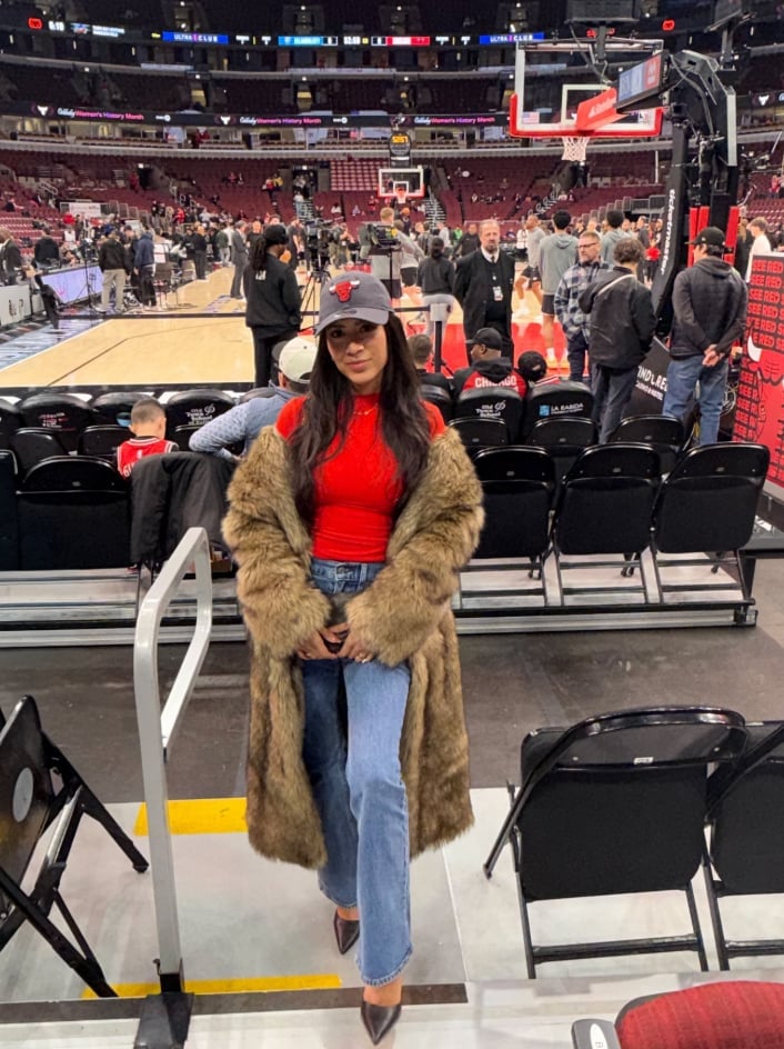 Faux Fur Coat Over Turtleneck and Flared Jeans — Simple Basketball Game Outfits