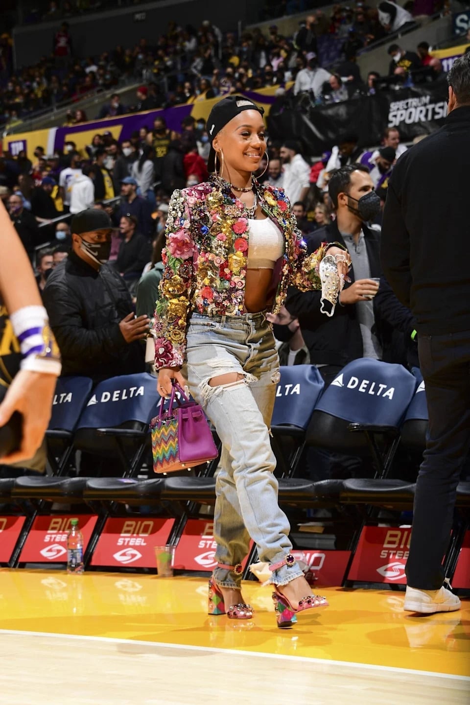 Embellished Jacket Over Crop Top with Ripped Jeans — Simple Basketball Game Outfits