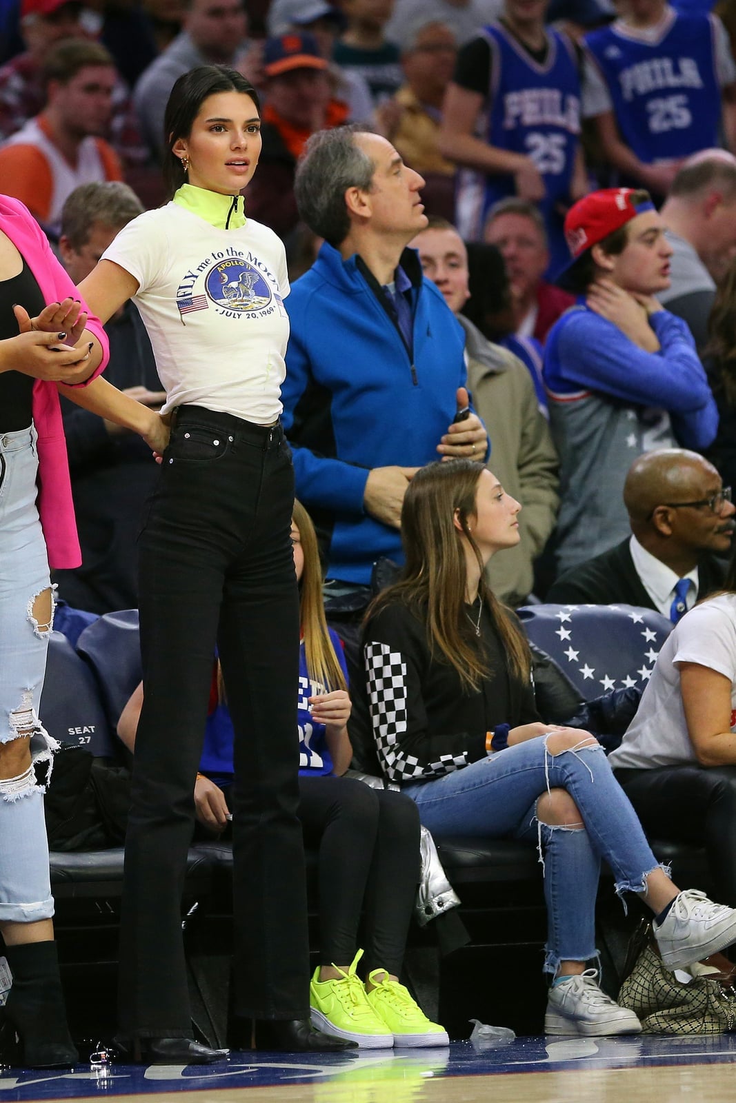 Graphic T-Shirt with Straight Leg Jeans and Neon Sneakers — Simple Basketball Game Outfits