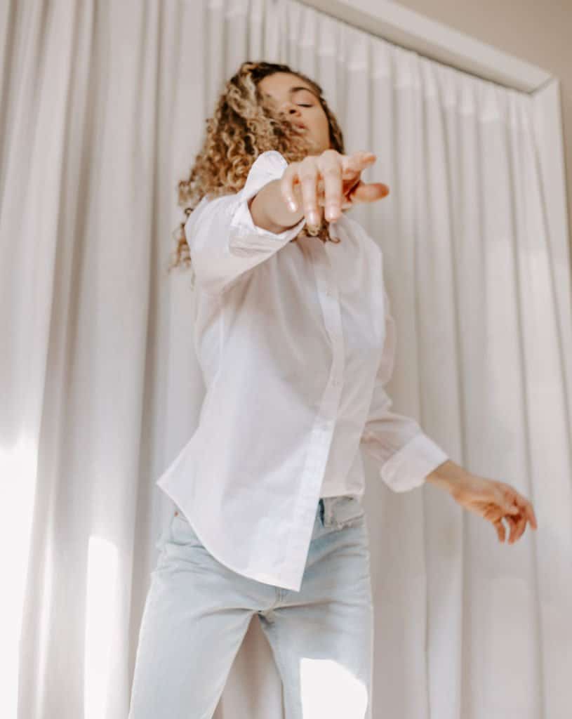 Oversized White Shirt with Light Blue Jeans, Close-Up Take — Simple Button Down Outfits