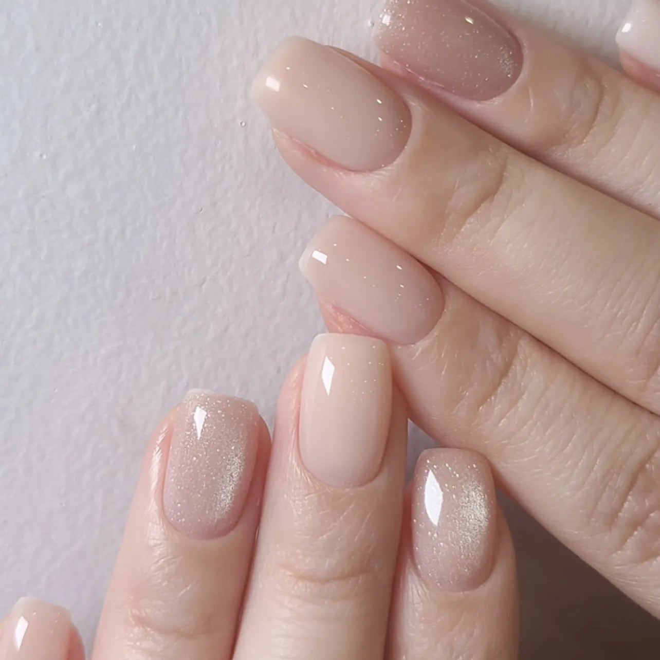 Short Square Sheer Nude With Glitter Accents Short Square Sheer Nude With Glitter Accents — Simple Champagne Nails