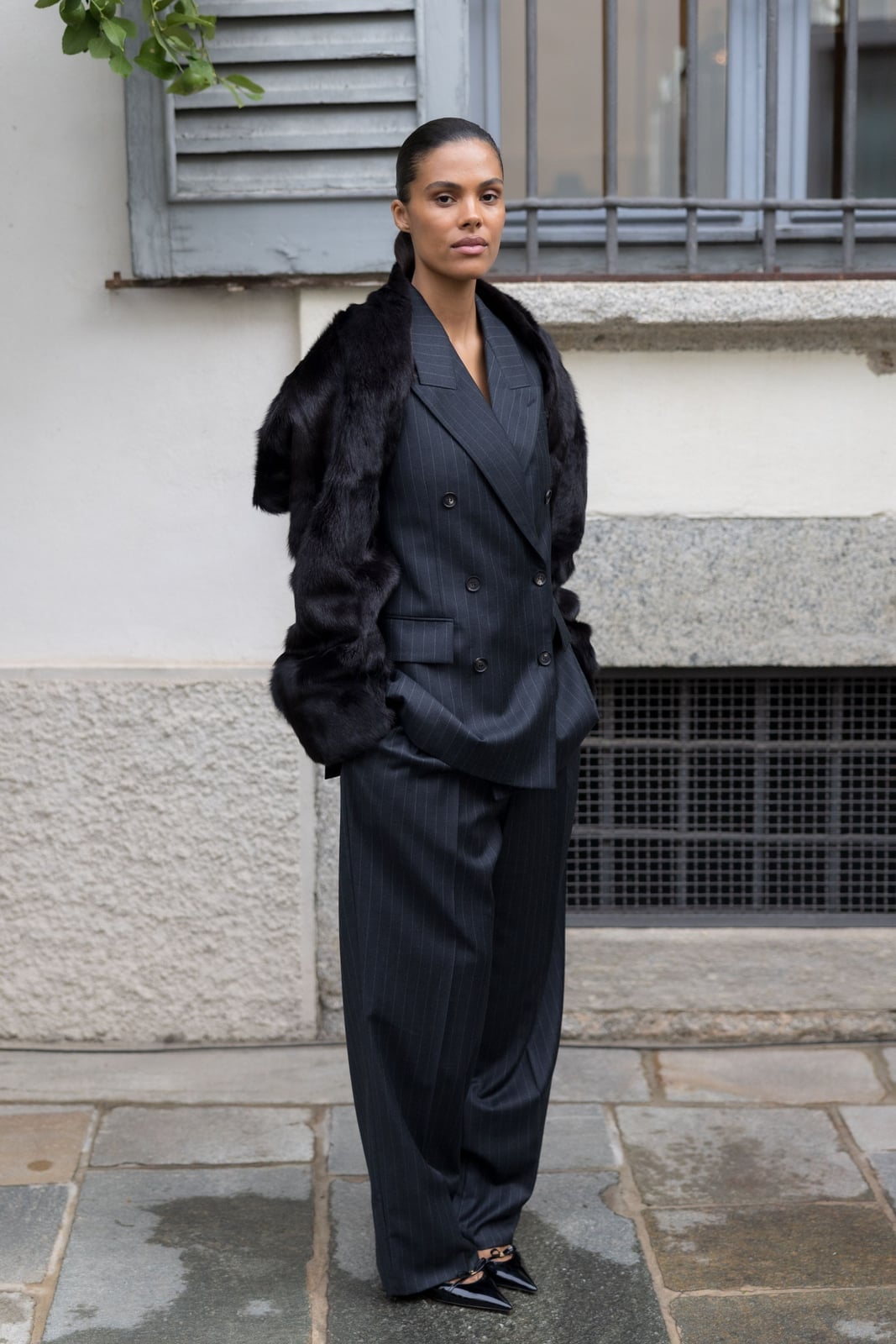 A Fur-Trimmed Pinstripe Suit Makes a Statement A Fur-Trimmed Pinstripe Suit Makes a Statement — Simple Corporate Outfits for Women