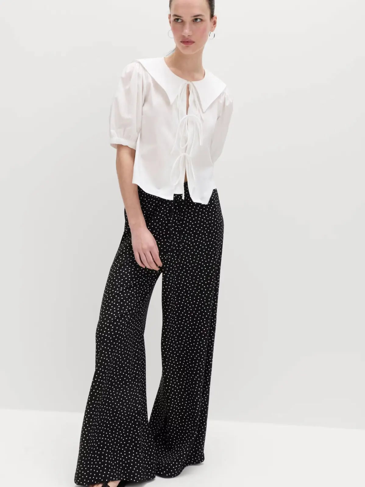 White Puff-Sleeve Blouse with Polka Dot Trousers White Puff-Sleeve Blouse with Polka Dot Trousers — Simple Court Outfits