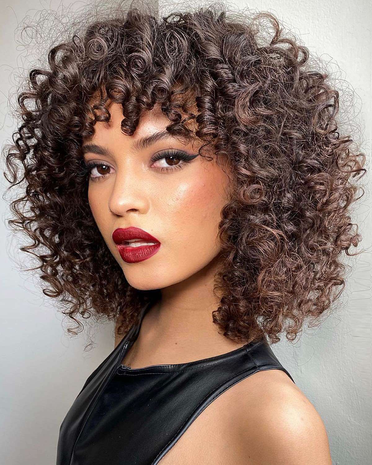 Chin Length Bob With Full Defined Curly Bangs — Simple Curly Bangs