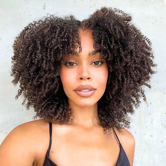 Collarbone Layers With Defined Curls — Simple Curly Bangs