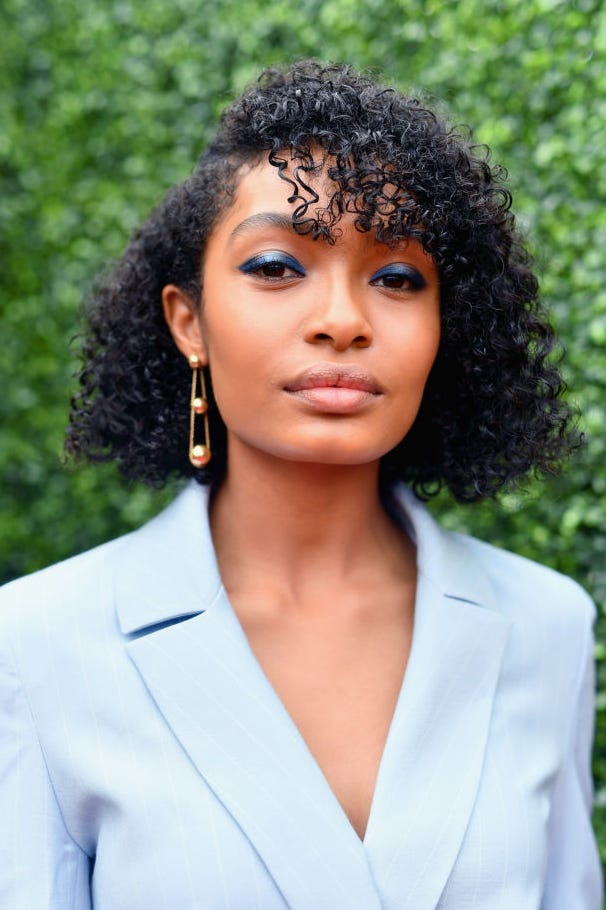 Collarbone Layers With Glossy Black Curls — Simple Curly Bangs