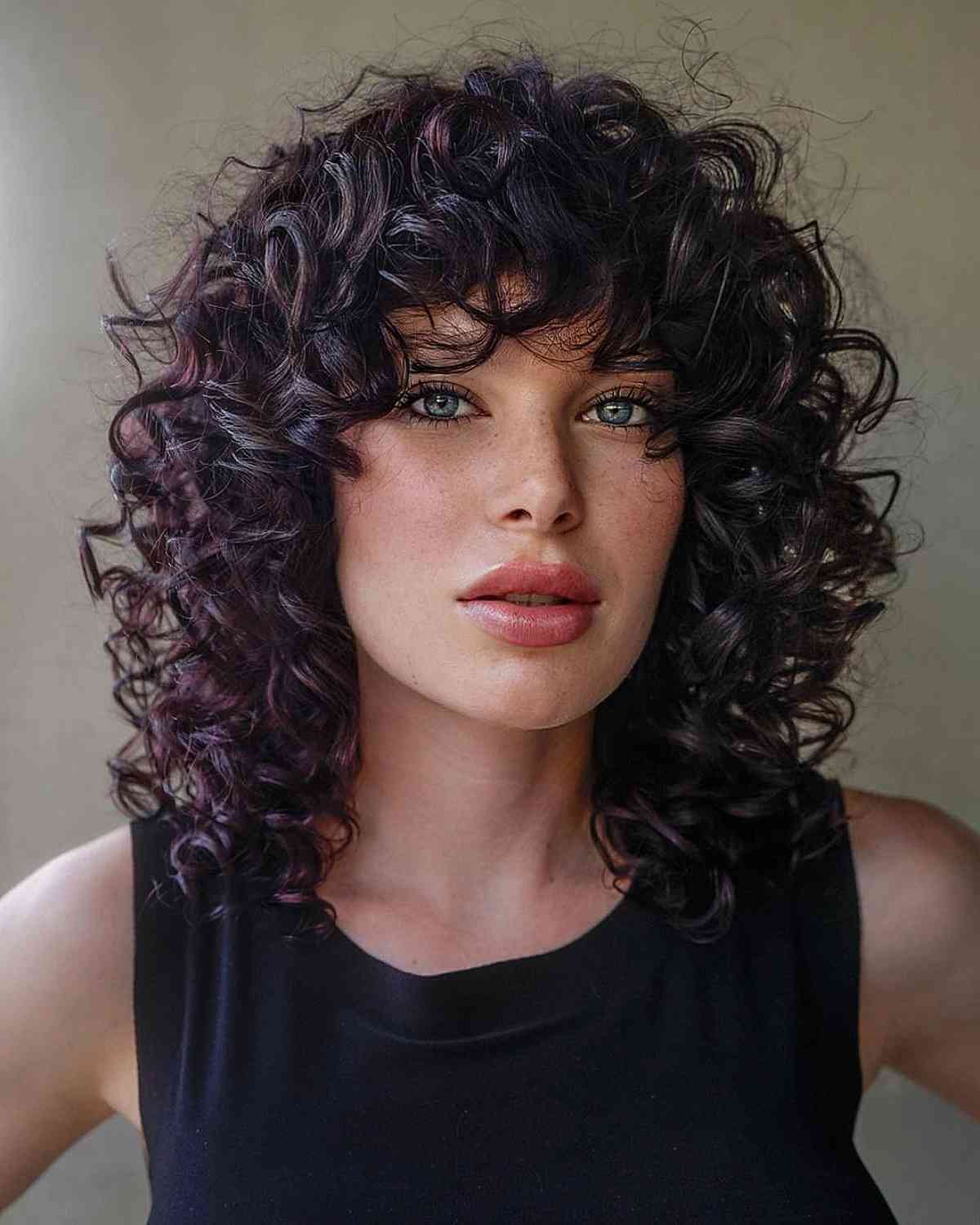 Collarbone Shag With Deep Dark Brown Curly Bangs — Simple Curly Bangs