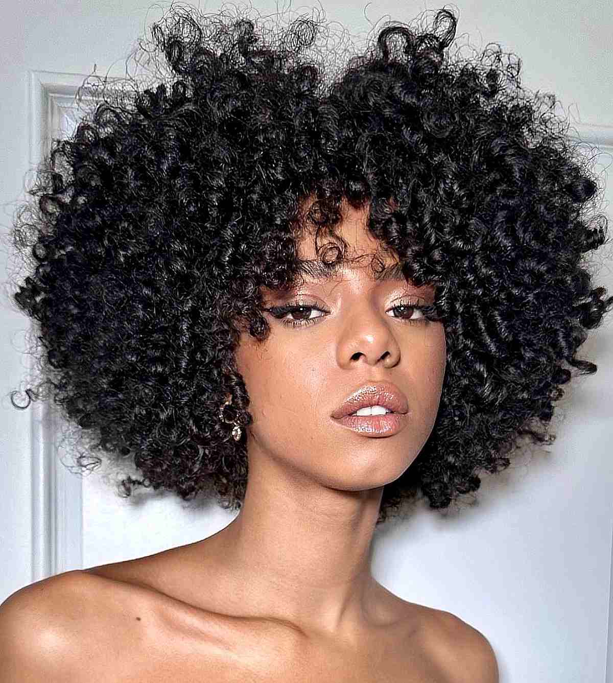 Rounded Black Afro Cut Rounded Black Afro Cut — Simple Curly Hair Cuts