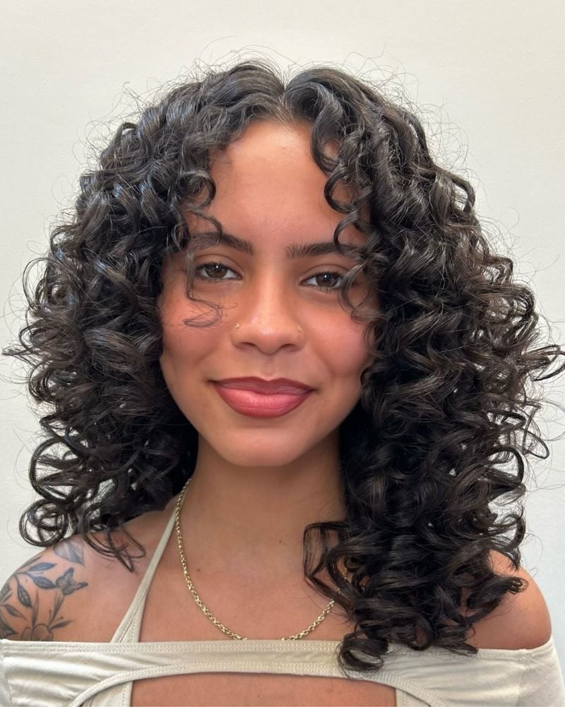 Layered Bob With Face-Framing Curtain Bangs Layered Bob With Face-Framing Curtain Bangs — Simple Curly Hair Cuts