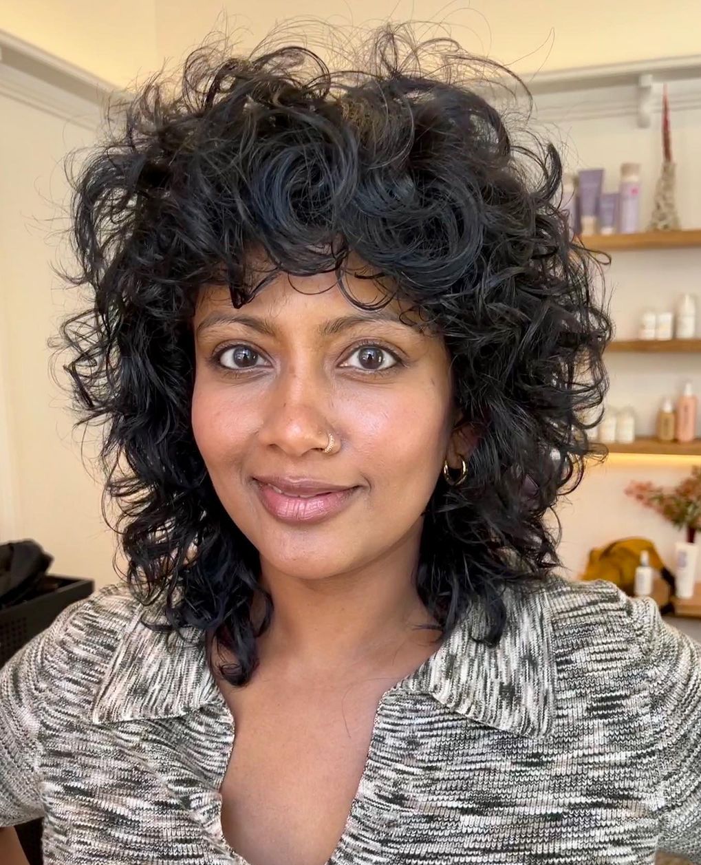 Shoulder Shag With Voluminous Curls Shoulder Shag With Voluminous Curls — Simple Curly Shag