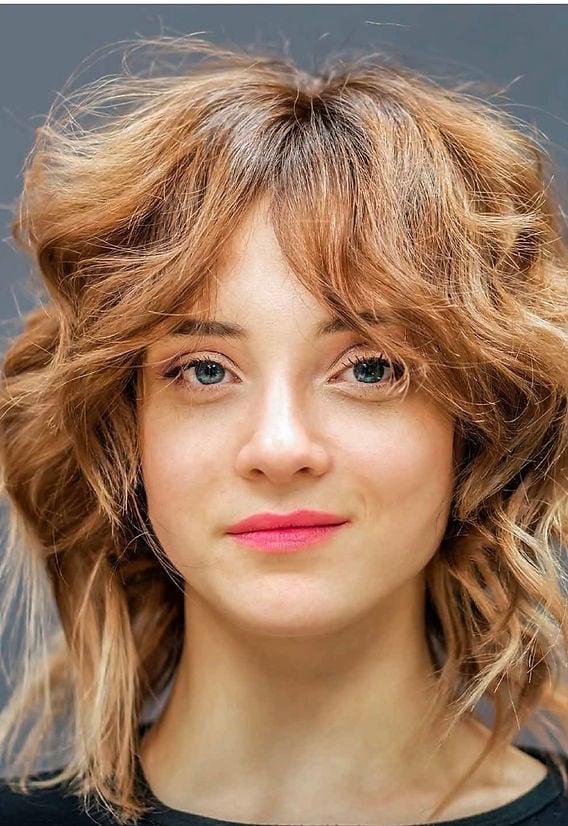 Collarbone Shag With Honey Blonde Curtain Bangs Collarbone Shag With Honey Blonde Curtain Bangs — Simple Curly Shag