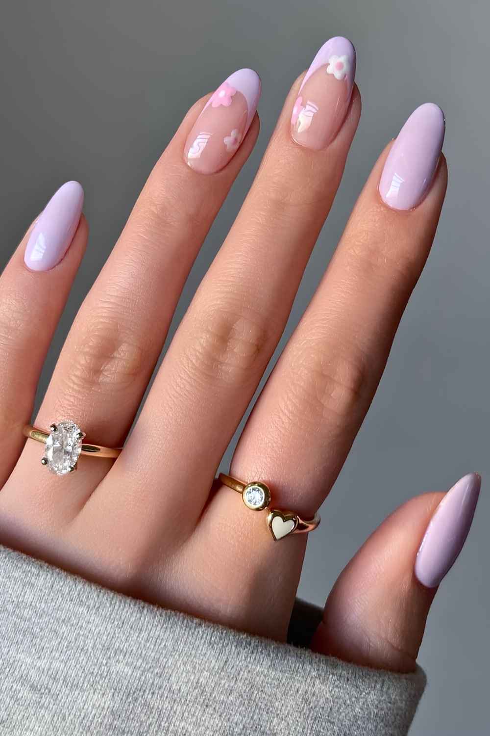 Medium Almond Lavender French Tip Nails with Flowers, Close-Up Take Medium Almond Lavender French Tip Nails with Flowers, Close-Up Take — Simple Floral Nails