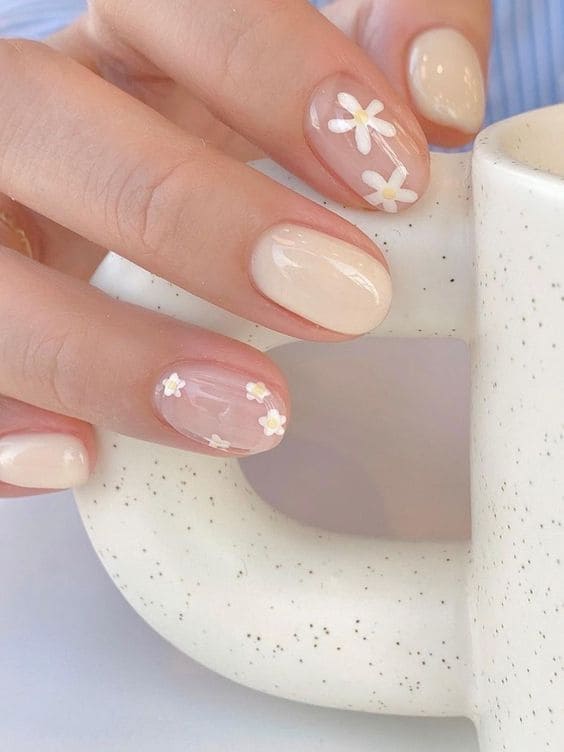 Sheer Nude Oval Nails With Tiny White Flowers Sheer Nude Oval Nails With Tiny White Flowers — Simple Flower Nails