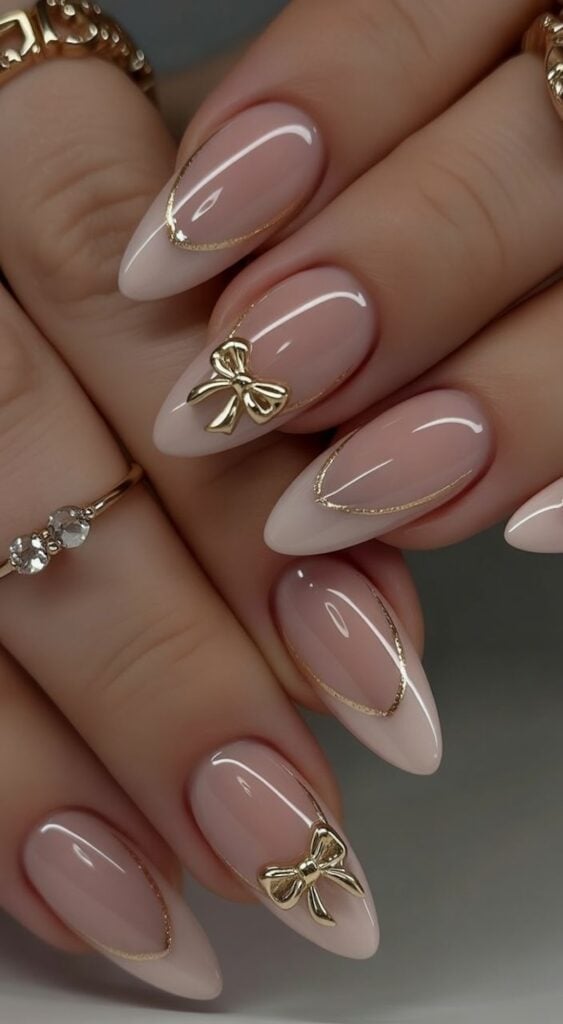 3D Gold Bow Medium Stiletto Nails 3D Gold Bow Medium Stiletto Nails — Simple Formal Nails