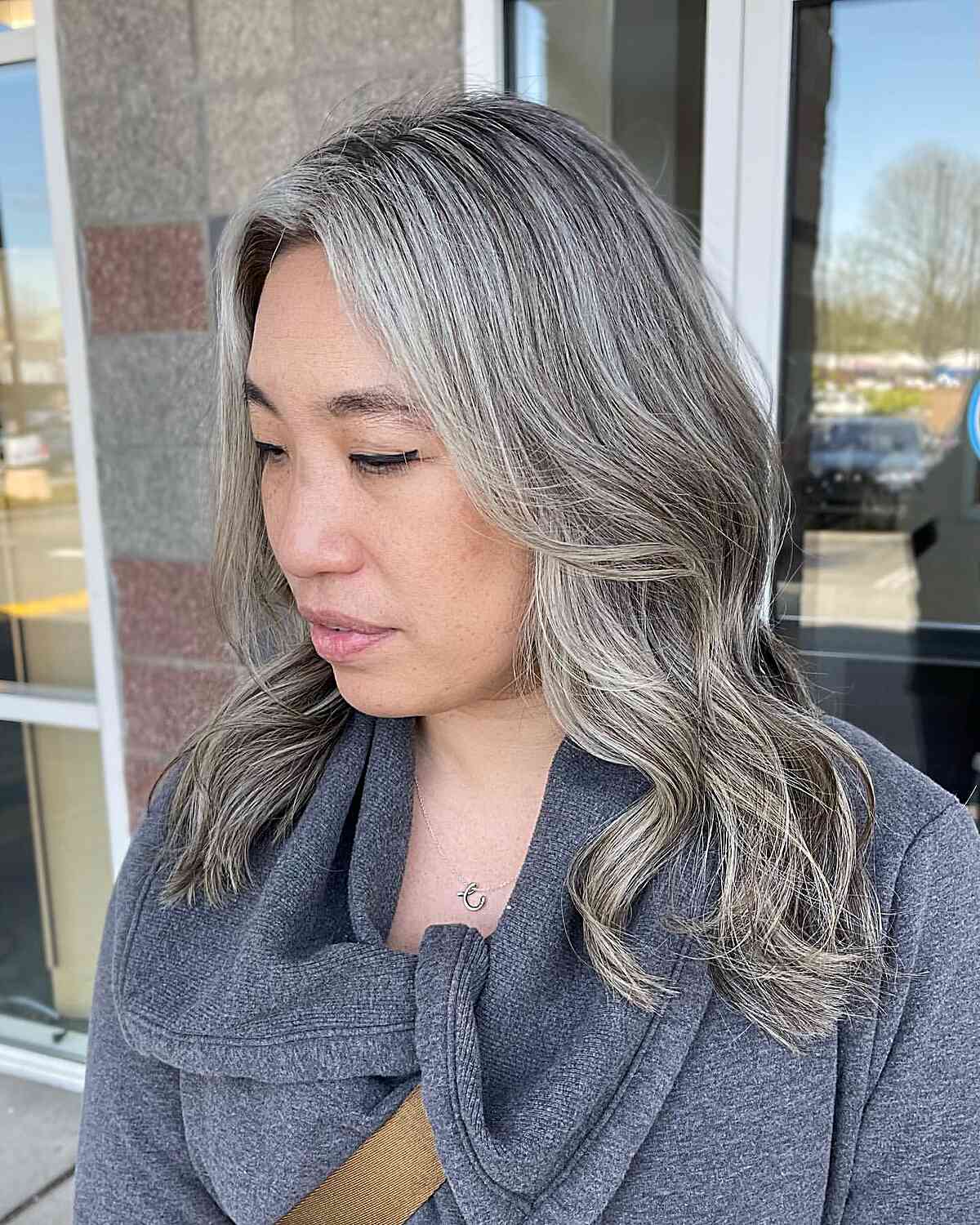 Mid-Back Layers With Curtain Bangs and Ash Blend — Simple Gray Blending