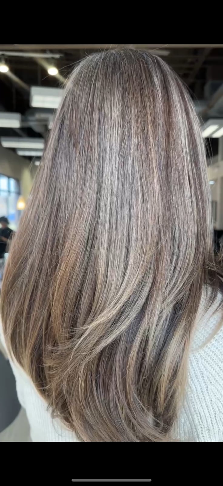 Mid-Back Layers With Gray and Ash Blonde Blend and Wavy Texture — Simple Gray Blending