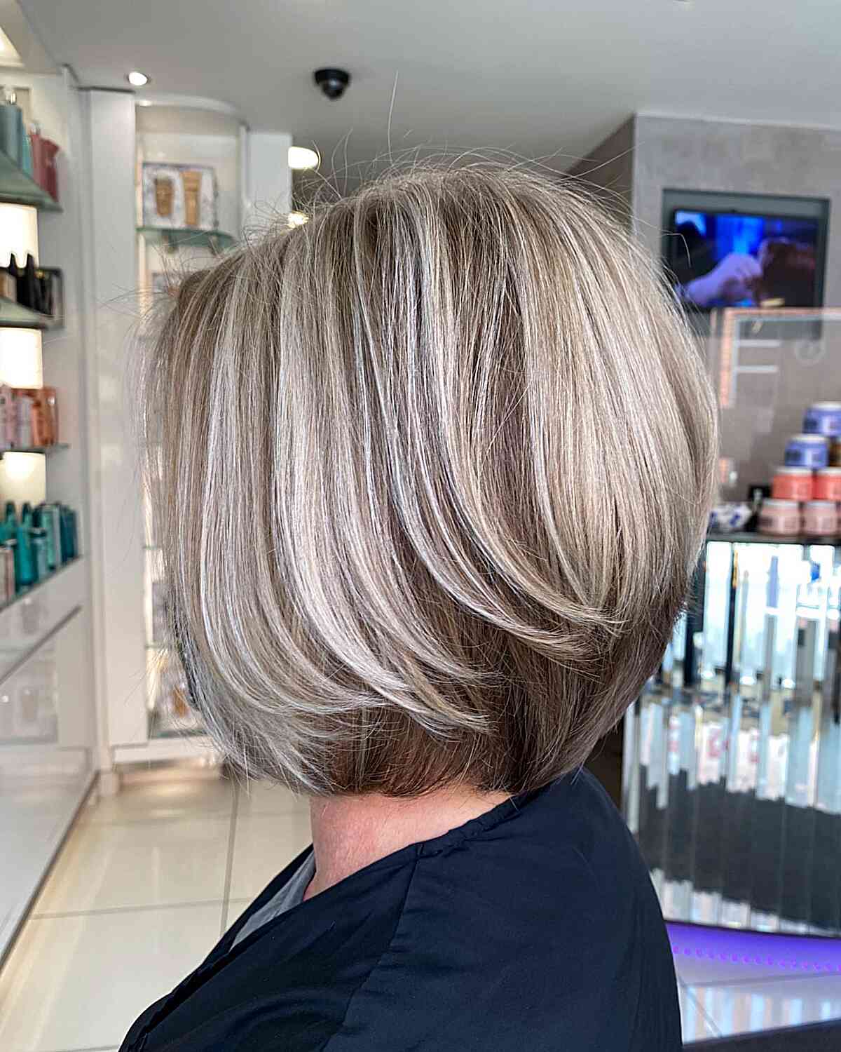 Chin Bob With Side Swept Bangs and Gray Undertones — Simple Gray Blending