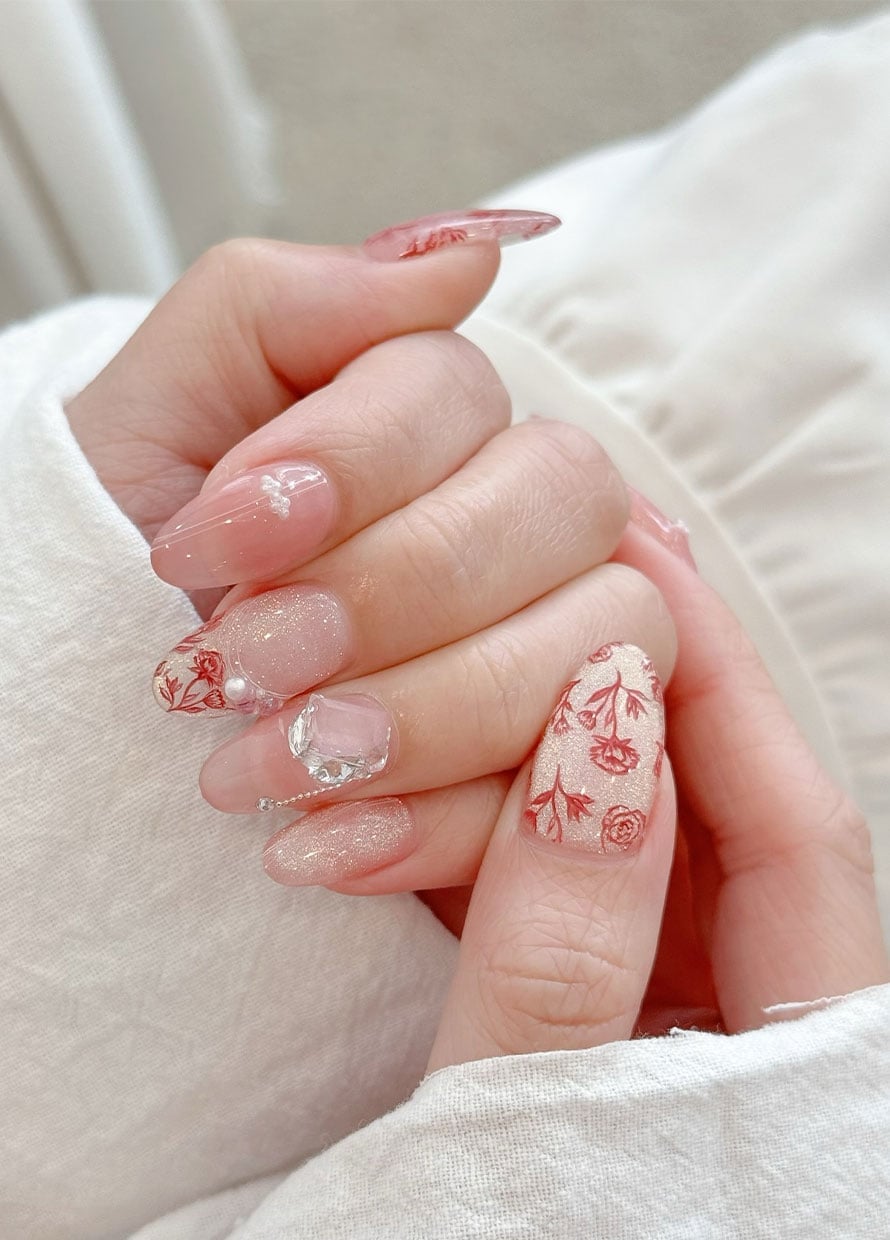 Medium Almond Nails With Red Floral Art and Pearls Medium Almond Nails With Red Floral Art and Pearls — Simple Japan Nails