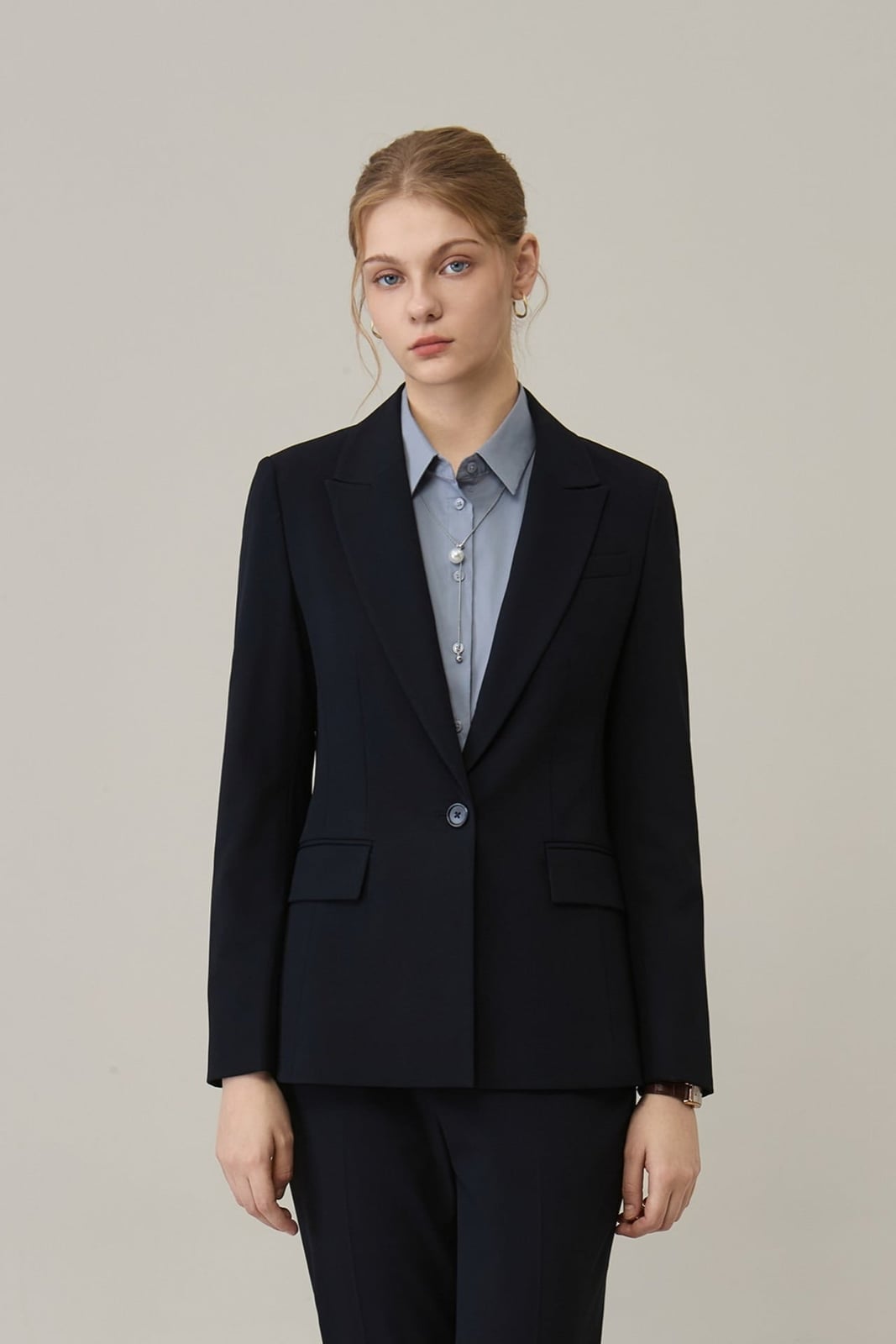 Navy Blazer with Light Blue Collared Shirt and Small Hoop Earrings — Simple Job Interview Outfits