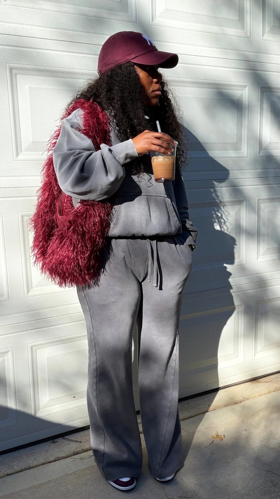Faux Fur Vest Over Hoodie And Sweatpants — Simple Jordans Outfits