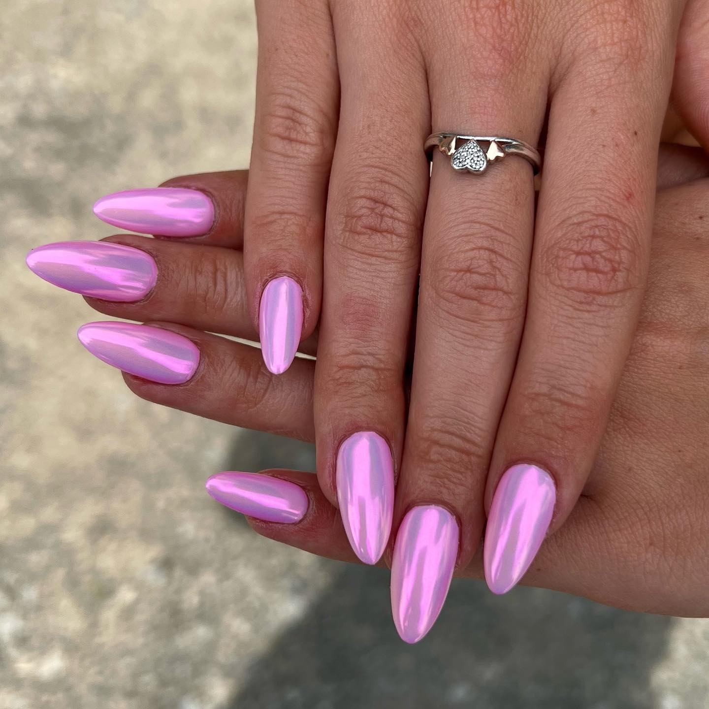 Vibrant Metallic Pink Chrome Stiletto Nails With Against An Outdoor Vibrant Metallic Pink Chrome Stiletto Nails With Against An Outdoor — Simple Metallic Nails