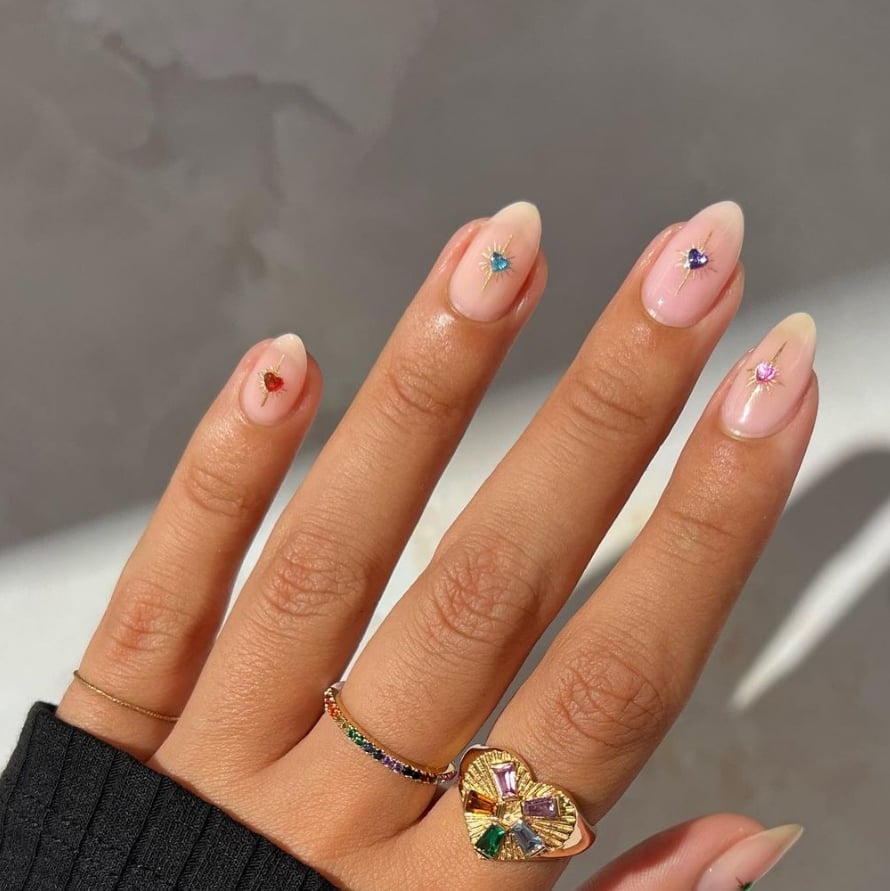 Medium Almond Milky Pink With Heart Rhinestones Medium Almond Milky Pink With Heart Rhinestones — Simple Nail Art Inspo