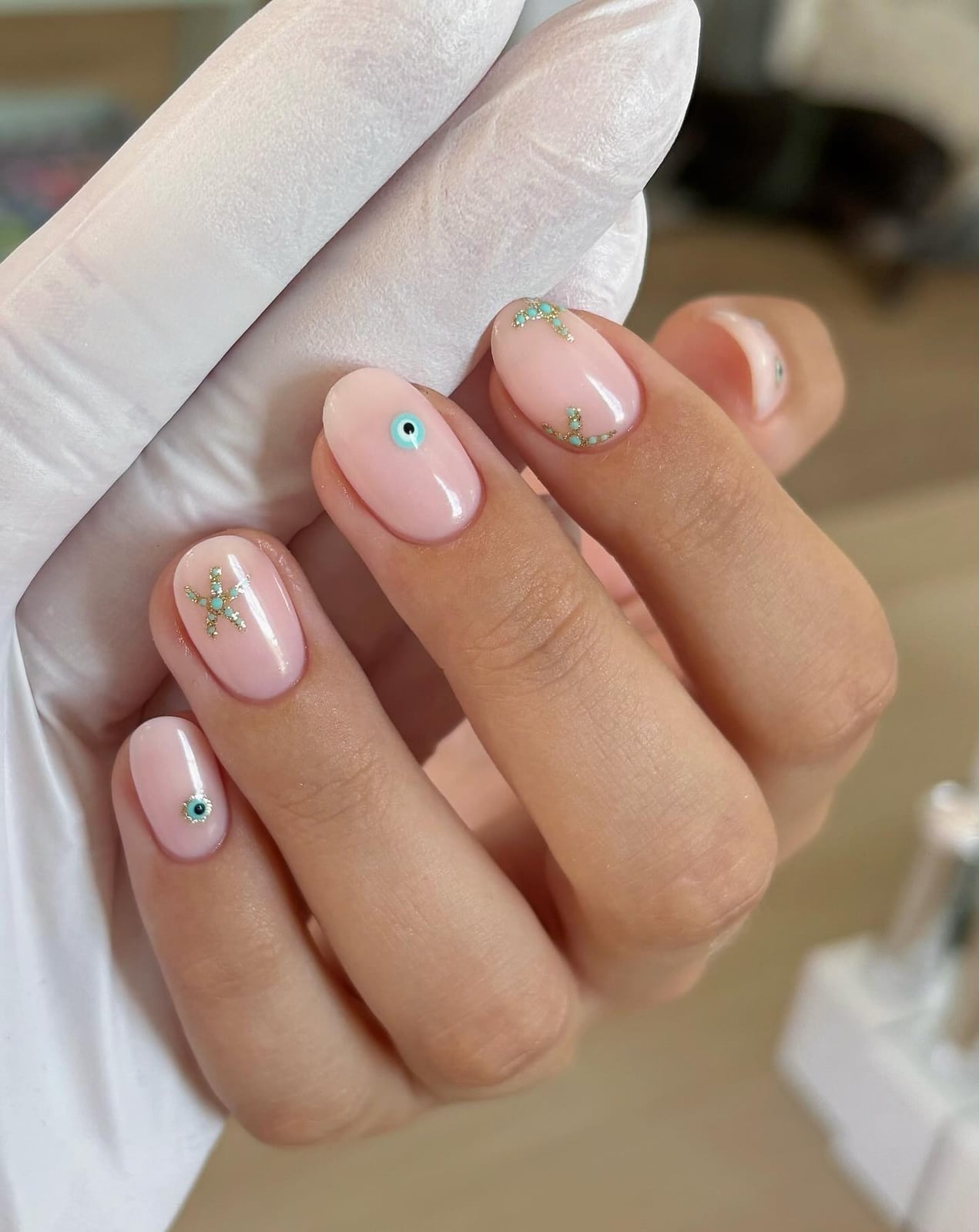 Short Oval Pink With Gold Charms Short Oval Pink With Gold Charms — Simple Nail Art Inspo