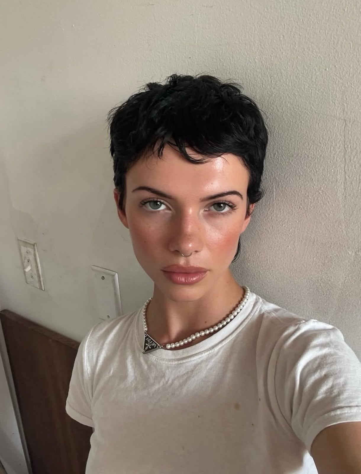 Thick Dark Brown Curly Pixie With Defined Bangs — Simple Pixie Hairstyles