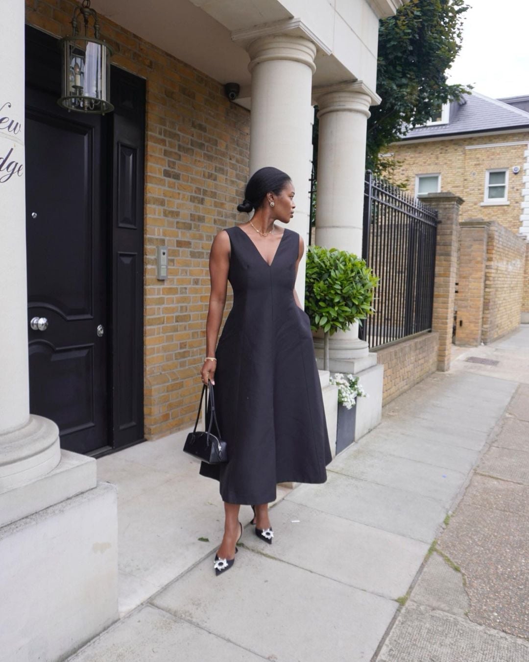 Black Sleeveless Midi Dress with Deep V-neckline Black Sleeveless Midi Dress with Deep V-neckline — Simple Semi Formal Dresses