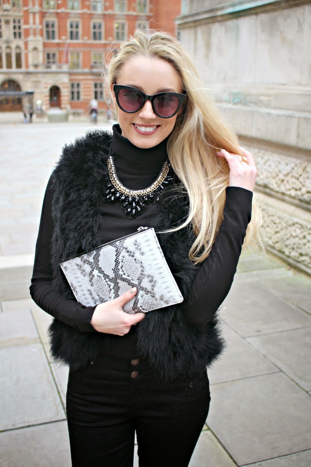 Black Skinny Jeans With Faux Fur Vest And Statement Necklace — Simple Skinny Jeans Outfits