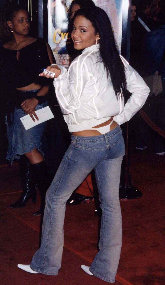 Low Rise Flared Jeans with Visible Thong and Zip-Up Jacket Low Rise Flared Jeans with Visible Thong and Zip-Up Jacket — Trendy 2000s Outfits Party