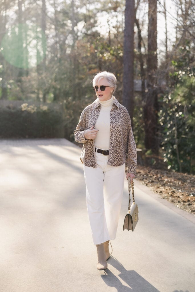 Leopard Print Jacket Over a Cream Turtleneck and White Jeans — Trendy 50s Style