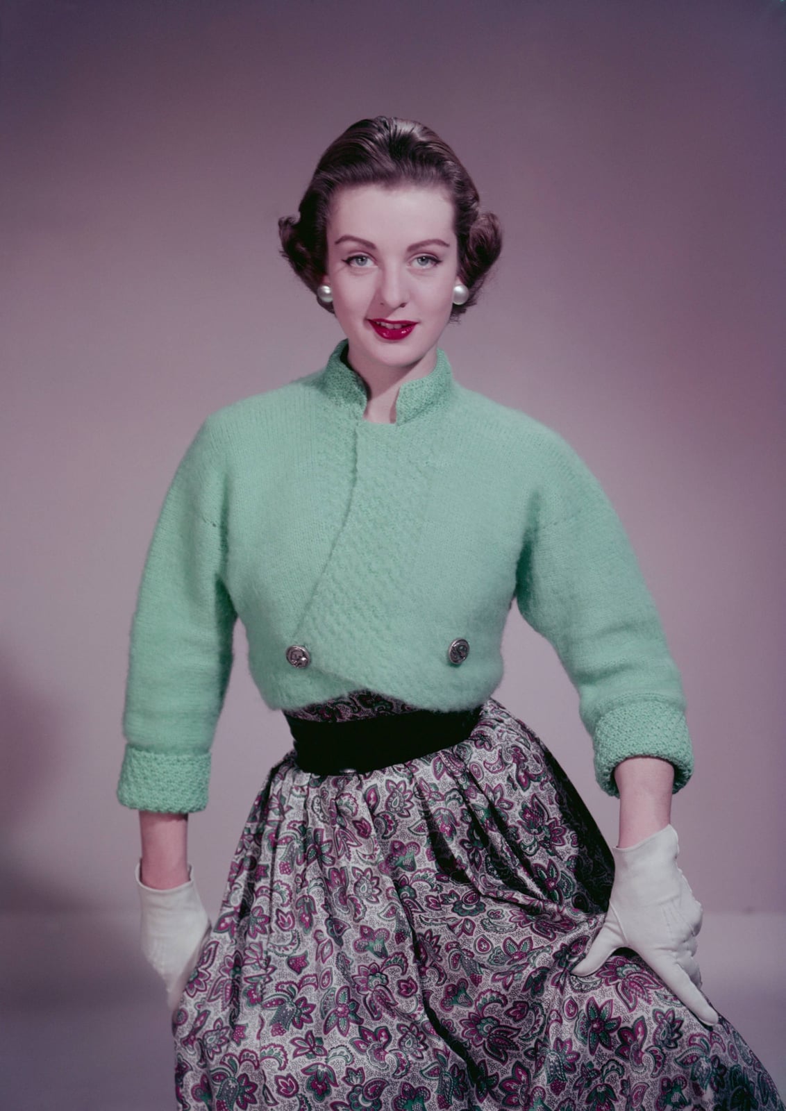 Mint Green Cropped Knit Cardigan Over a Patterned Midi Skirt — Trendy 50s Style