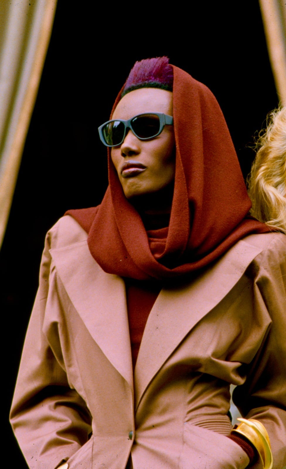 Tan Trench Coat Over a Turtleneck with a Hooded Scarf Tan Trench Coat Over a Turtleneck with a Hooded Scarf — Trendy 80s Party Outfit