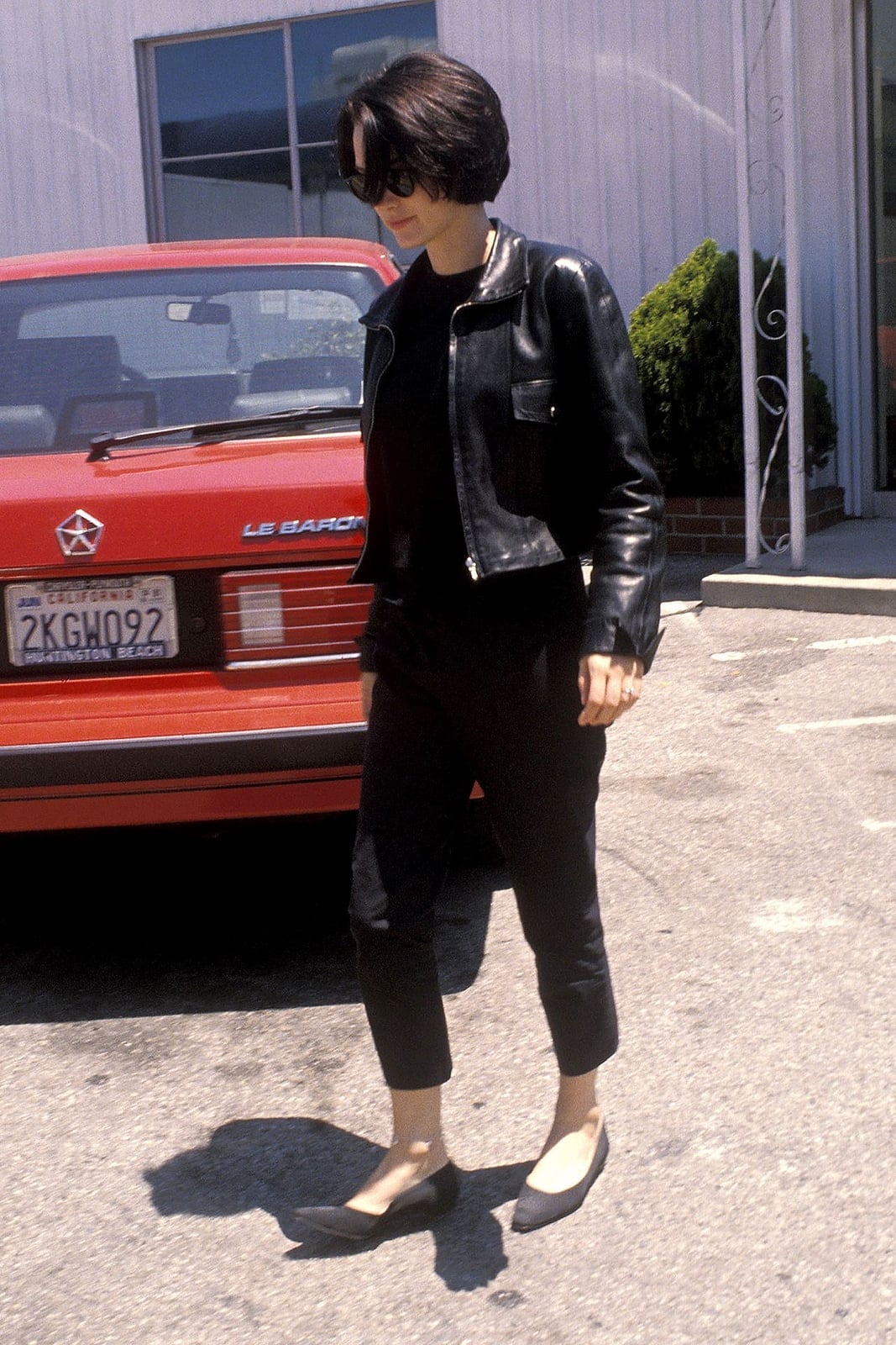 Black Leather Jacket with Cropped Straight-Leg Pants — Trendy 90s Style