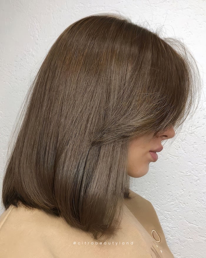 Chin Length Ash Brown Bob With Curtain Bangs — Trendy Ash Brown Hair