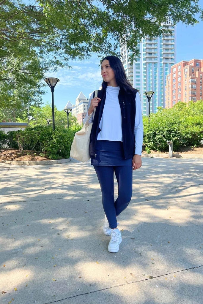 Fleece Vest Over Skirt Overlay Leggings and Sneakers — Trendy Athleisure Outfits