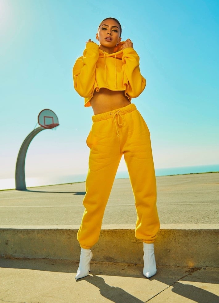 Bright Yellow Tracksuit with Pointed-Toe Boots — Trendy Athleisure Outfits