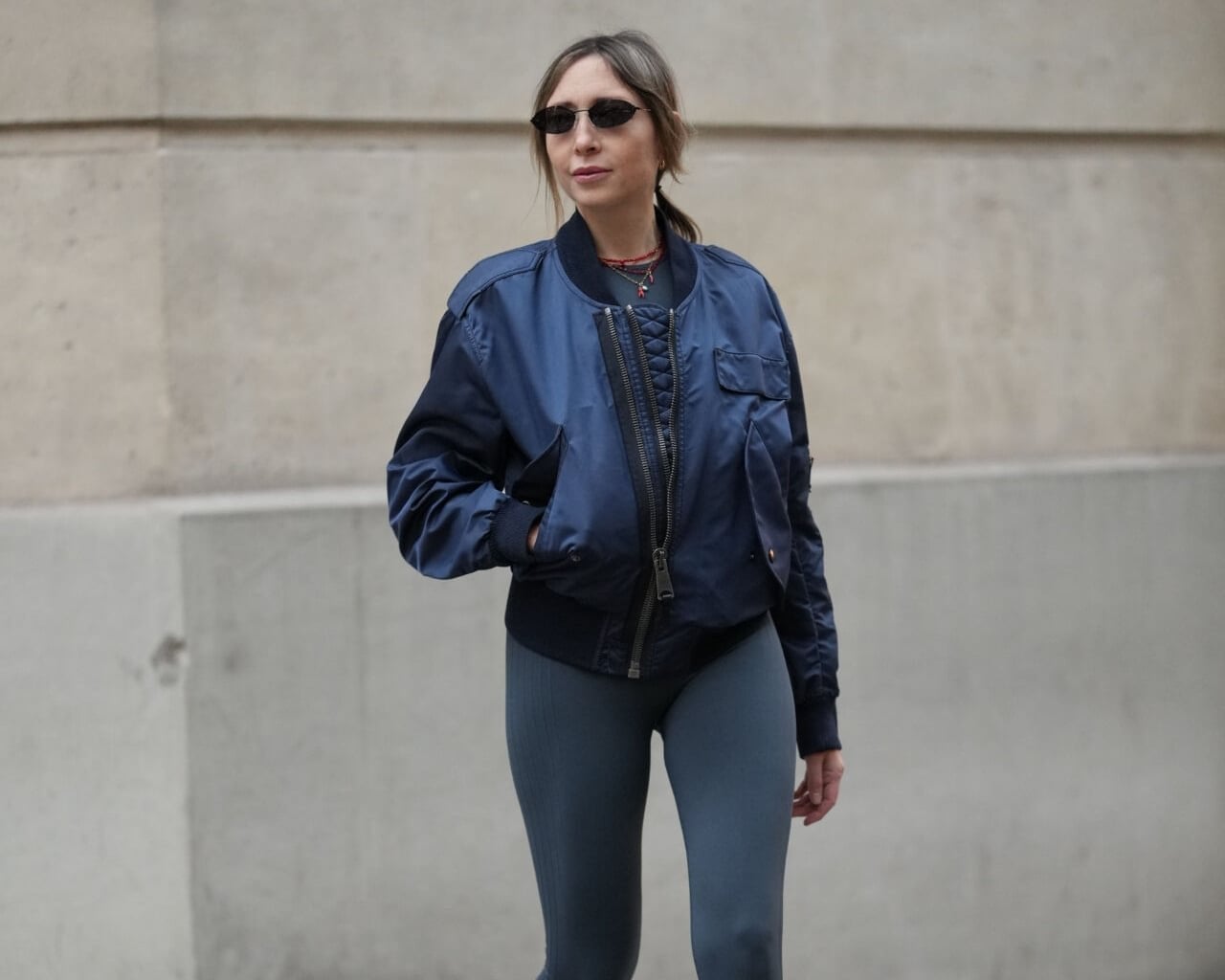Navy Bomber Jacket with Gray Leggings and Sneakers — Trendy Athleisure Outfits