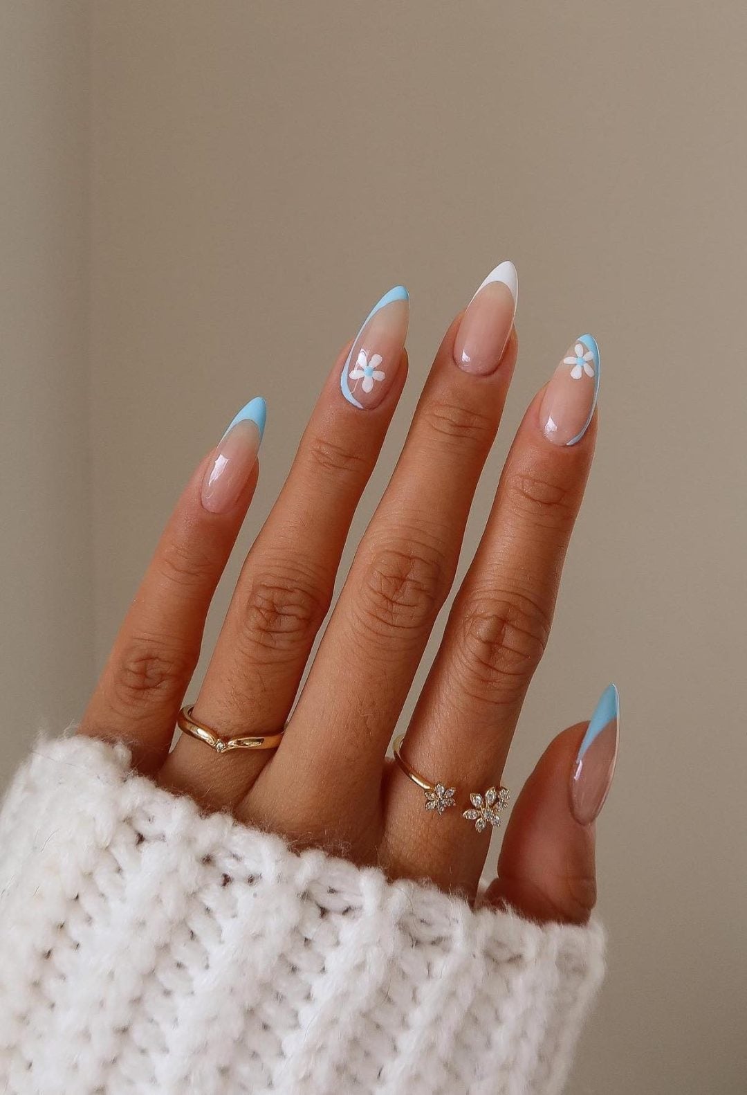 Long Almond French Tips With Floral Accents — Trendy Baby Blue Nails