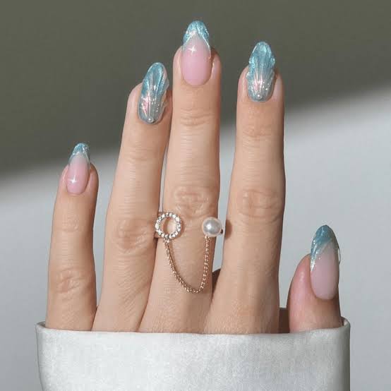 Almond Nails With Iridescent Baby Blue Waves — Trendy Baby Blue Nails