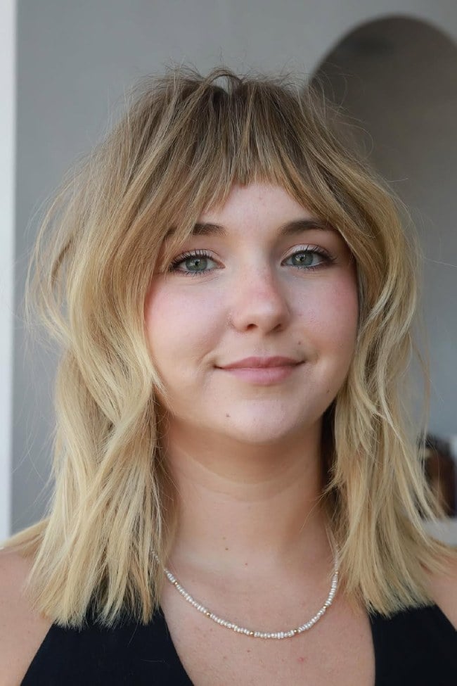 Shoulder Length Shaggy Blonde With Wispy Fringe Shoulder Length Shaggy Blonde With Wispy Fringe — Trendy Bangs Style