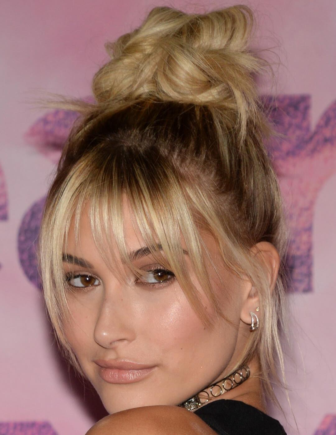 Shoulder Length Messy Bun With Wispy Bangs Shoulder Length Messy Bun With Wispy Bangs — Trendy Bangs Style