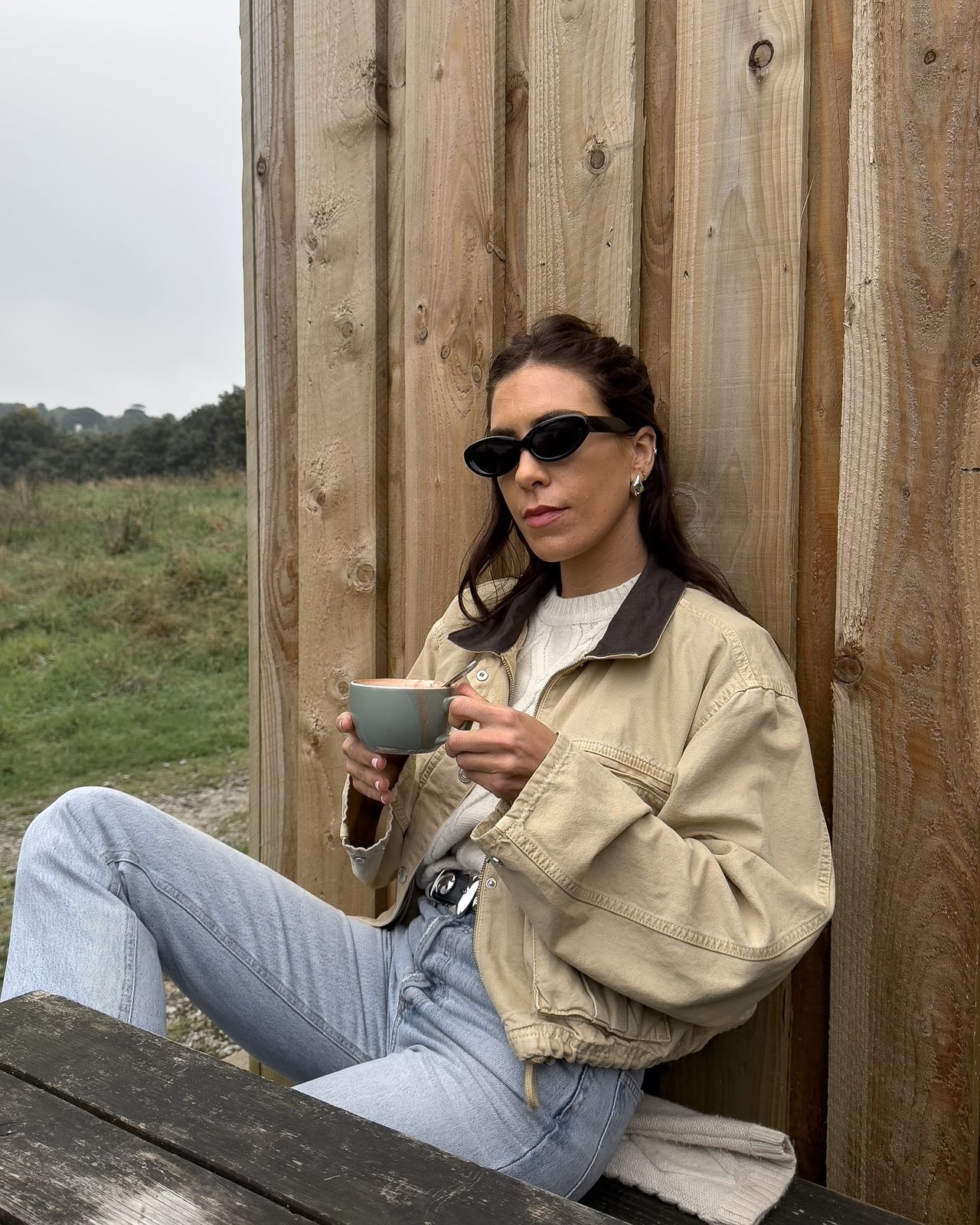 Beige Bomber Jacket with White Sweater and Relaxed Jeans Beige Bomber Jacket with White Sweater and Relaxed Jeans — Trendy Basic Outfits