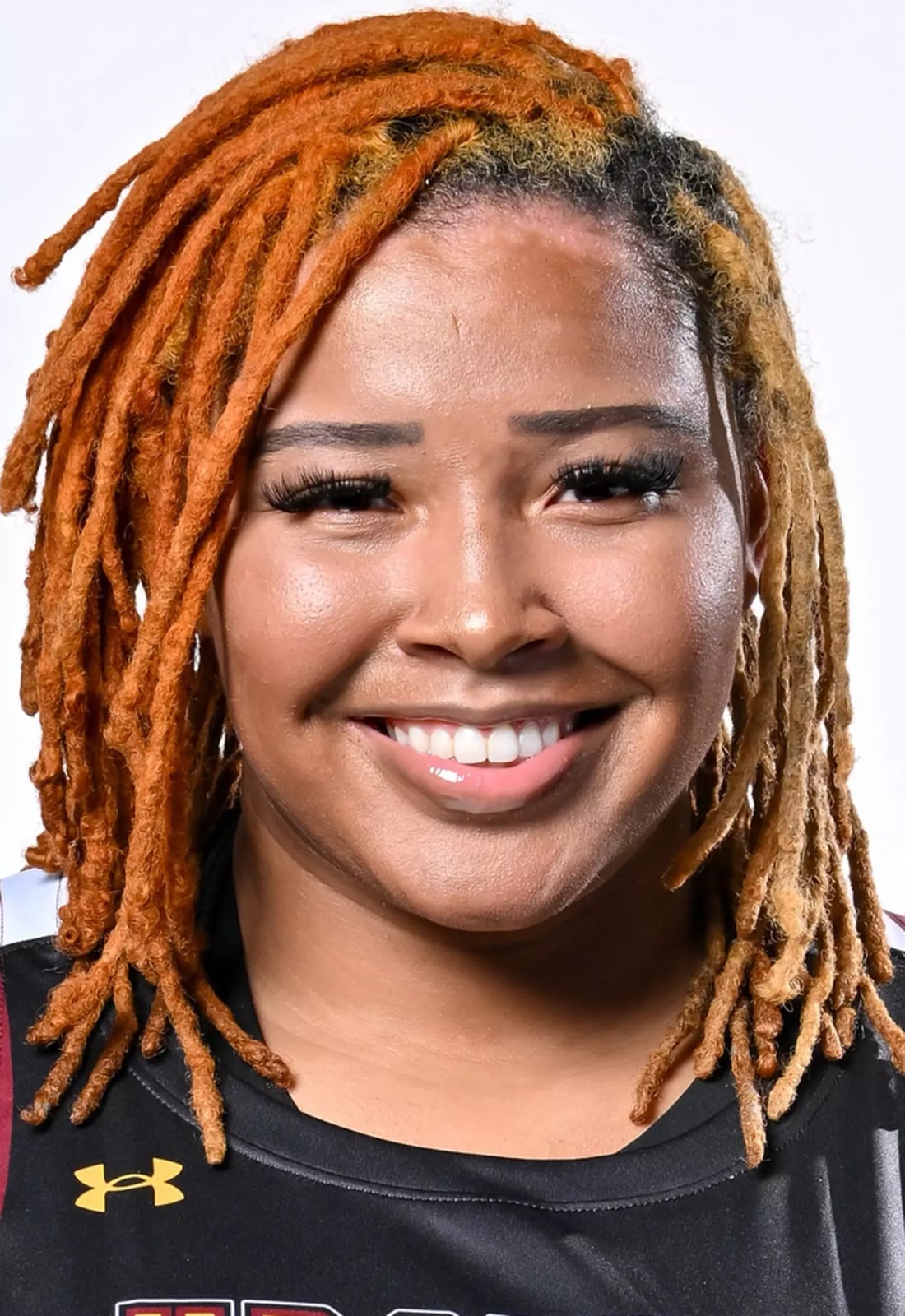 Mid-Back Vibrant Orange Dreadlocks With Highlights — Trendy Basketball Hairstyles
