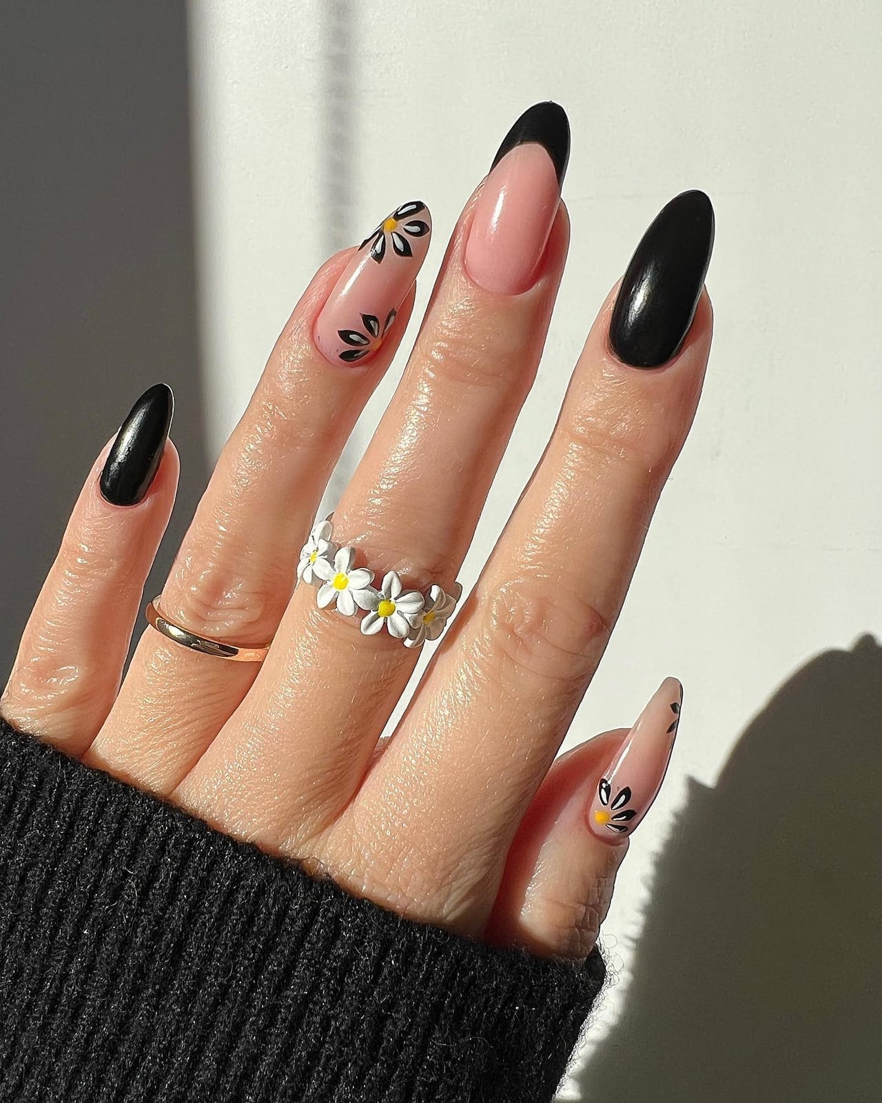 Long Almond Black French Tips With Daisy Art Long Almond Black French Tips With Daisy Art — Trendy Black Almond Nails