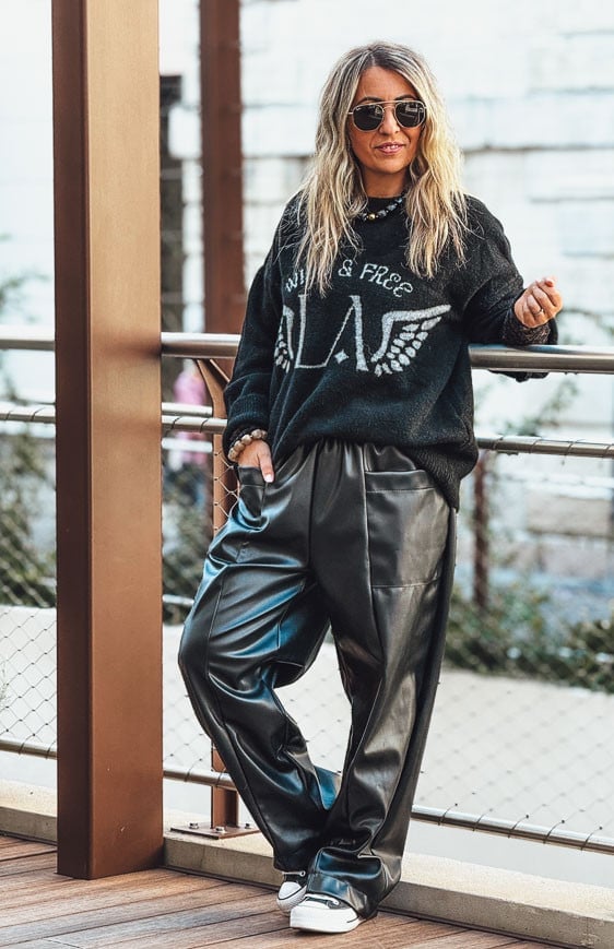 Relaxed Fit Black Leather Trousers with a Graphic Sweater — Trendy Black Leather Pants Outfit