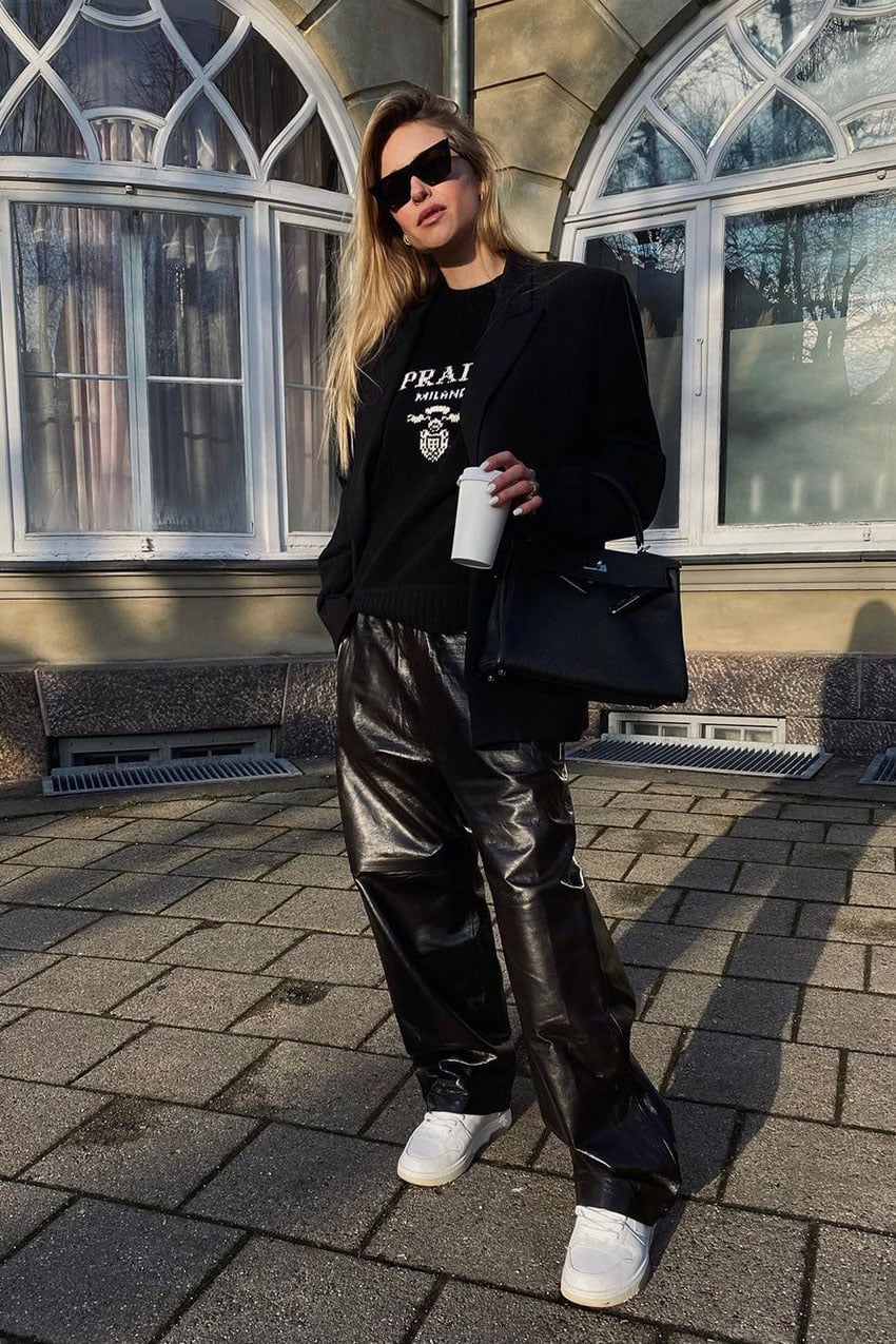 Wide-leg Black Leather Pants with a Graphic Sweater and Blazer — Trendy Black Leather Pants Outfit