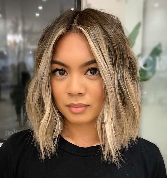Collarbone Bob With Face-Framing Curtain Bangs Collarbone Bob With Face-Framing Curtain Bangs — Trendy Blonde Balayage
